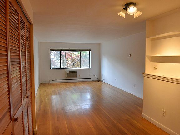 wall a/c near big window. big closet on left
