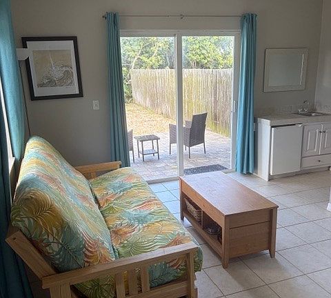 1st Floor with wet bar and backyard deck.