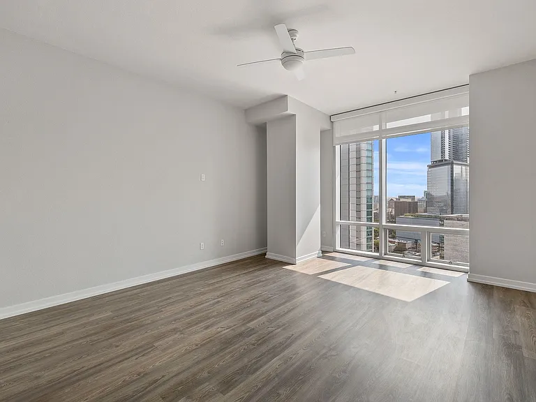 Floor-to-ceiling windows provide ample natural light