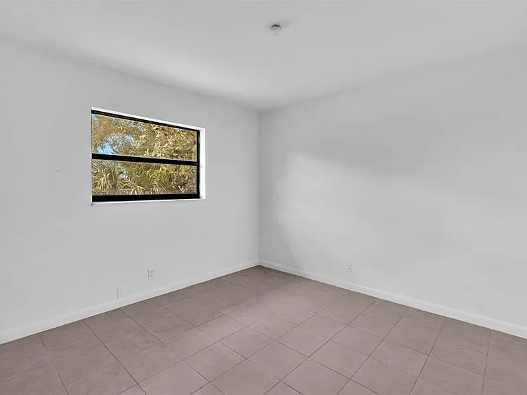 5748 NW 27th Ct — Photo 11
