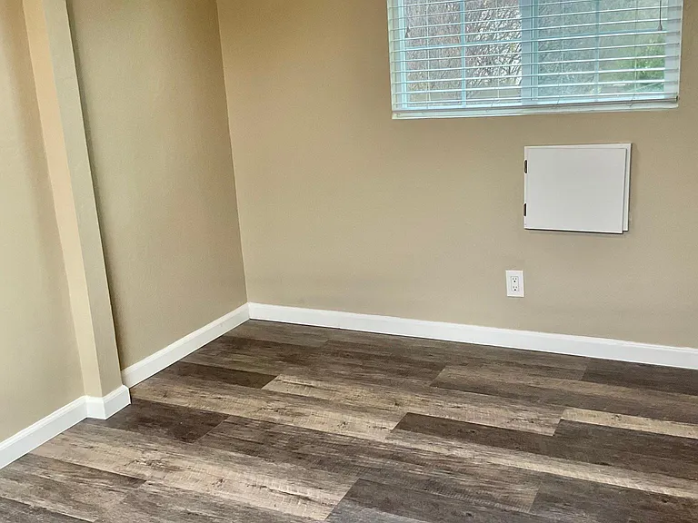 Bedroom with laminate floors