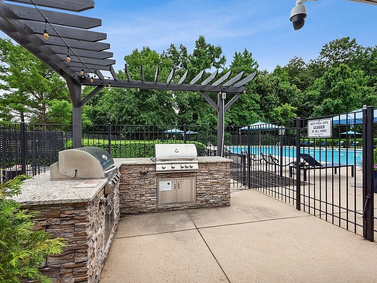 Enjoy a refreshing retreat at Eagle Rock Apartments at Belcamp, featuring a stunning pool area and a spacious outdoor grilling station. Perfect for entertaining or relaxing. Schedule your tour today and envision your new lifestyle!