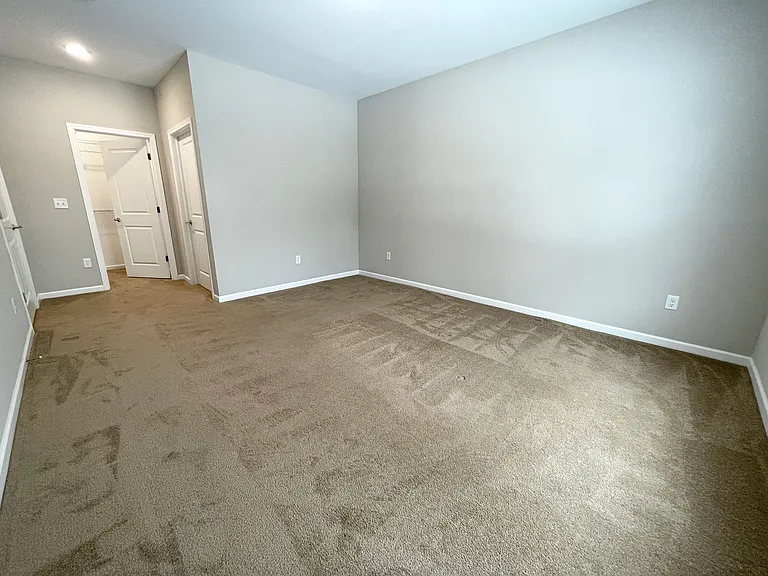 Primary Bedroom with Ensuite Bathroom & Walk-in Closet