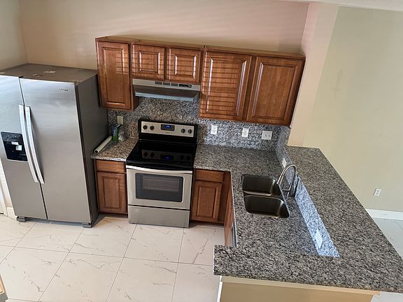 new granite new tile floors and fresh paint