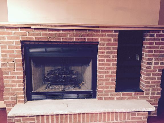 Brick fireplace in basement 