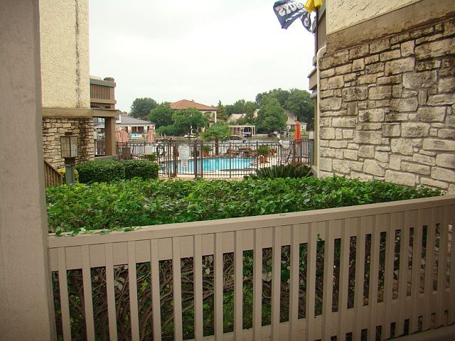 View from the patio of the pool, hot tub and Lake LBJ
