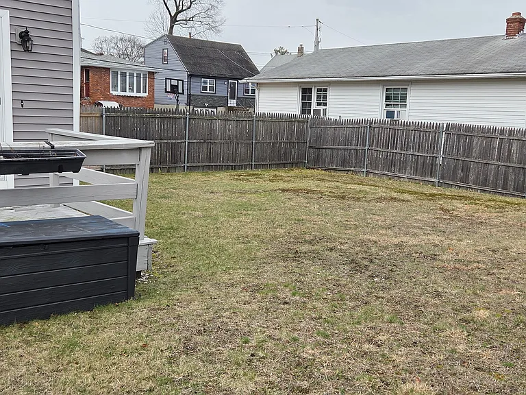 Large fenced in backyard.