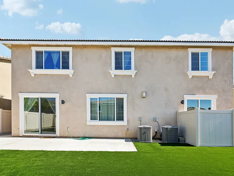 A well-maintained backyard designed to make every guest feel at home!