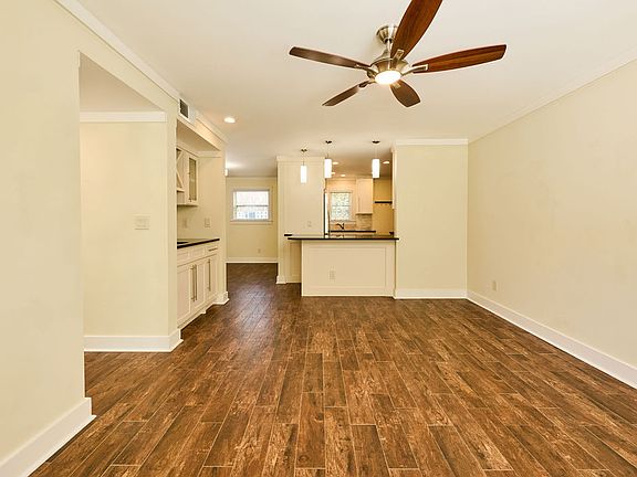 Second view of the living room facing the kitchen.