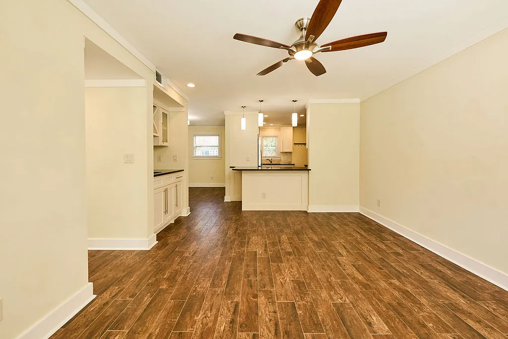 Second view of the living room facing the kitchen. - 2467 Peachtree Rd NE #1
