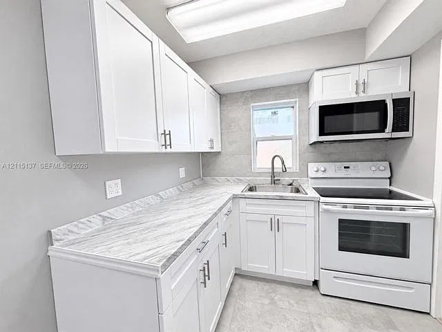 7870 SW 10th Ct — Photo 3