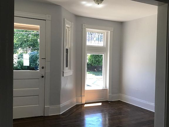 Living Room. Built in Bookshelf and awesome historic front w