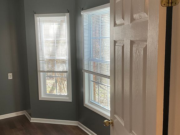 Fresh paint and new LVT in the master bed on main floor directly to your right when you walk in.