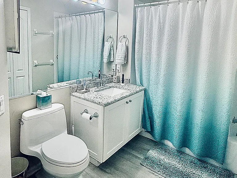 Guest Bathroom-remodeled granite, cabinets. Next to guest bedroom. Private split bedroom floor plan.