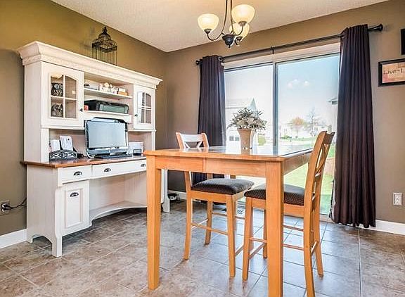 Spacious dining room has room for a large table and buffet.