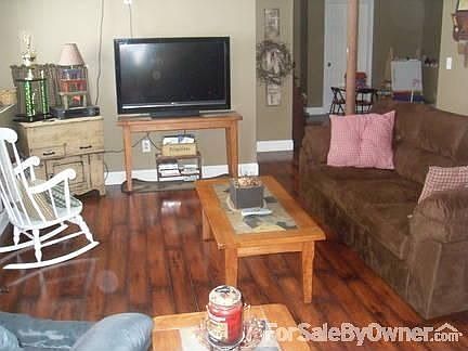 family room with kids playroom and new hard wood floors