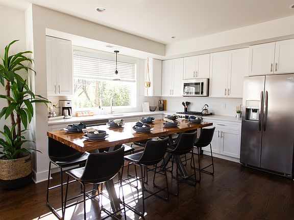 Fully Stocked Kitchen with Large Dining Table