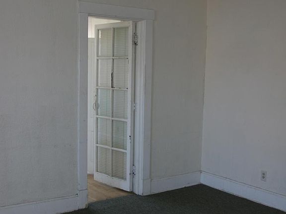 Living room with door to #1 bedroom