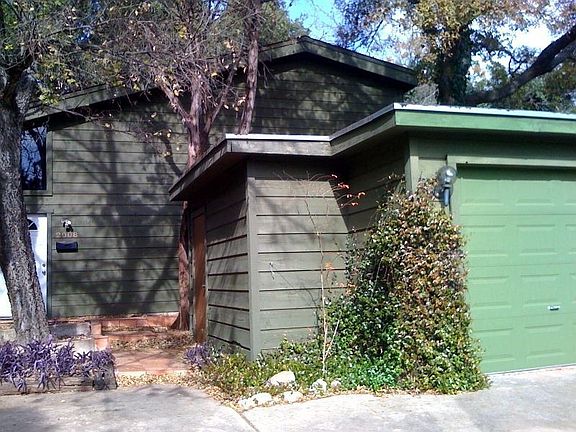front of house, showing attached garage