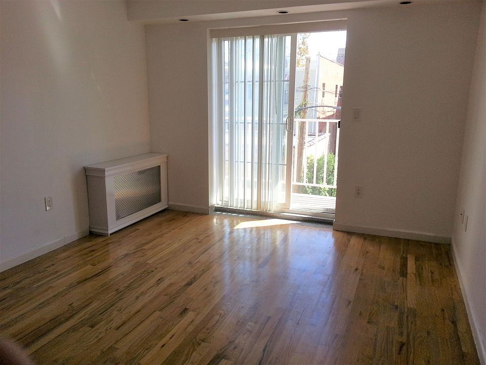 The backyard facing room with a private balcony
