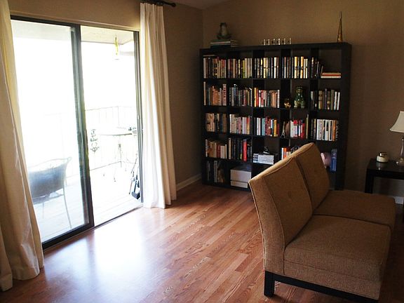 Large windows with sunny balcony
