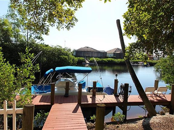 Overlooking a canal and basin with Gulf Access!