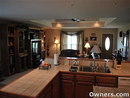 in kitchen looking into living room