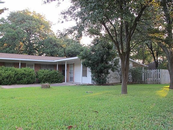 Shady front yard set back from Dexter Street