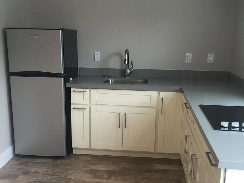 Kitchen with frig (frig included) no microwave