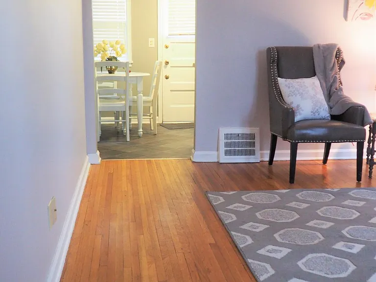 View of the living room and kitchen from front door
