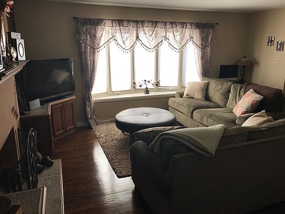 Refinished oak wood floors.