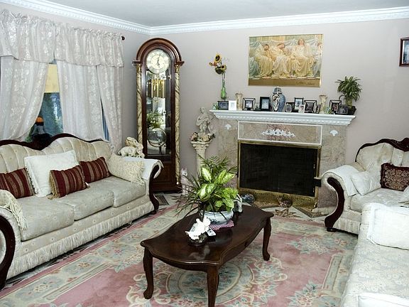 Living Room w/Marble Fireplace