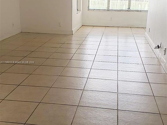 5th image of 3400 Pinewalk Dr N APT 915