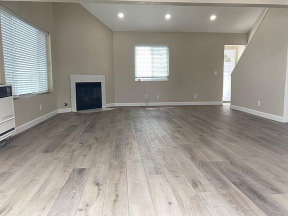 Living room with gas fireplace.