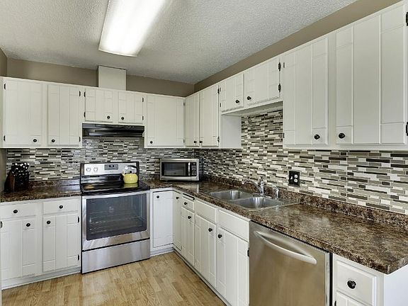 Open and functional kitchen with newer appliances