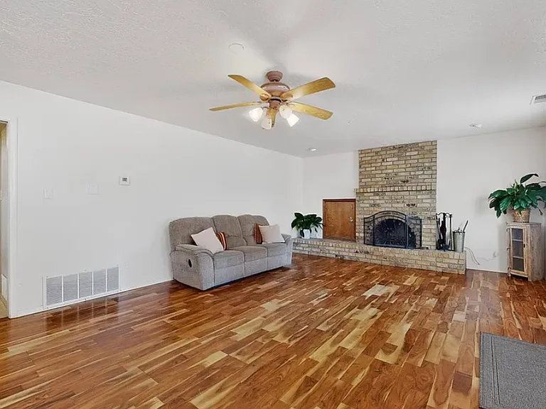 Den w/ Wood Burning Fireplace Before Rebuild 1