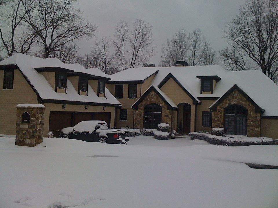 a rare snow covered lake home