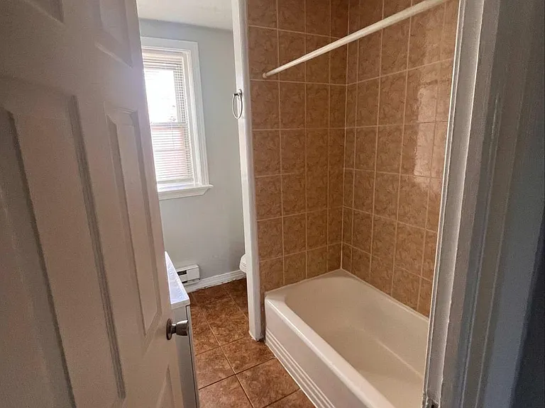 5457 Erdrick St — Photo 4