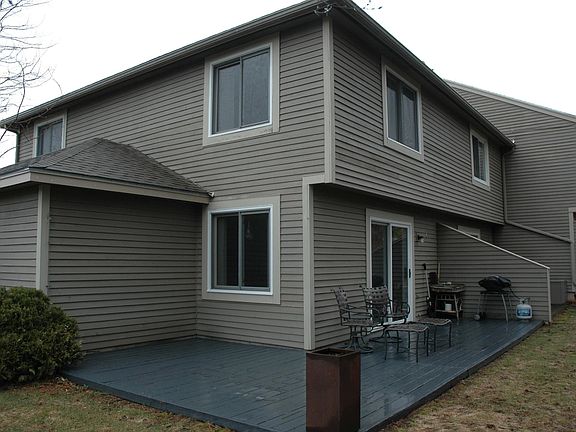 Oversized wrap around deck faces SW. Babbling brook to the South.