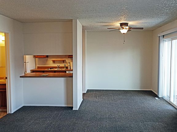Dining, pass through to kitchen/storage, and powder room (from living room)