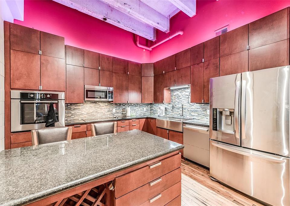 The updated kitchen is an asset for any homeowner! Beautiful cabinetry, granite countertops and gleaming stainless steel appliances - truly a chef's delight!