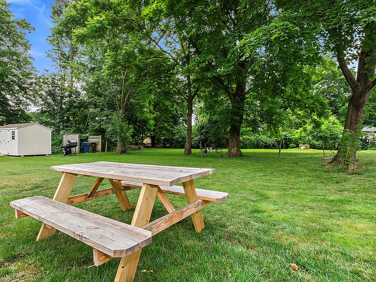 Back yard picnic table for residents
