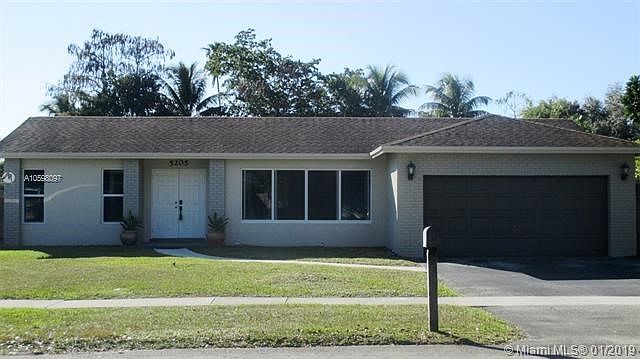 Front of Home.... Impact windows and  impact double front door.