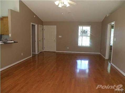 View of entrance into Family Room. Notice beautiful Bruce Wood Flooring.
