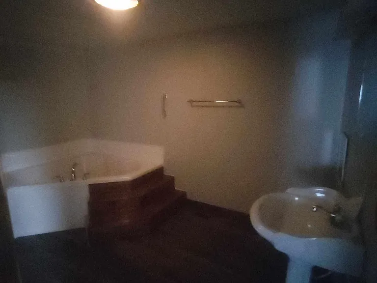 Master bath with dimmed lights