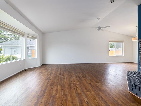 Large open living area with fireplace