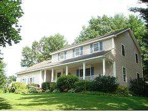 Front Porch & Lush Landscaping