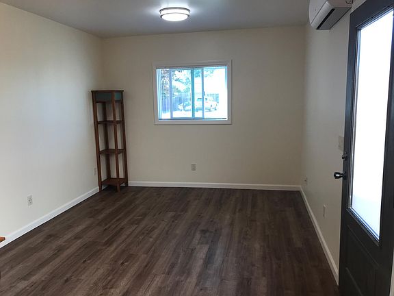 Living room. Wood style vinyl plank flooring throughout unit