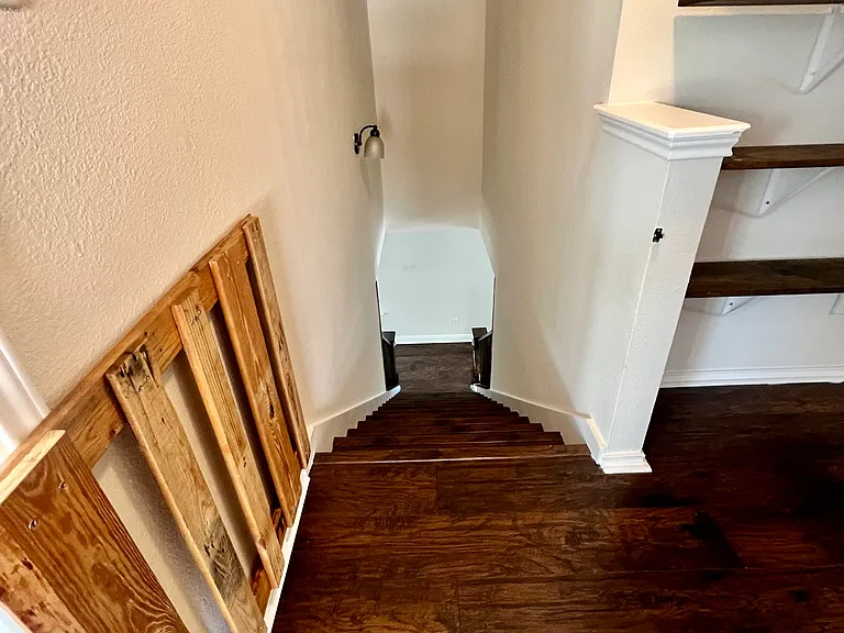 Stairway with gate from upstairs
