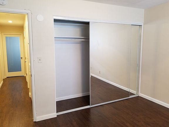 Beddroom 1 mirrored closet